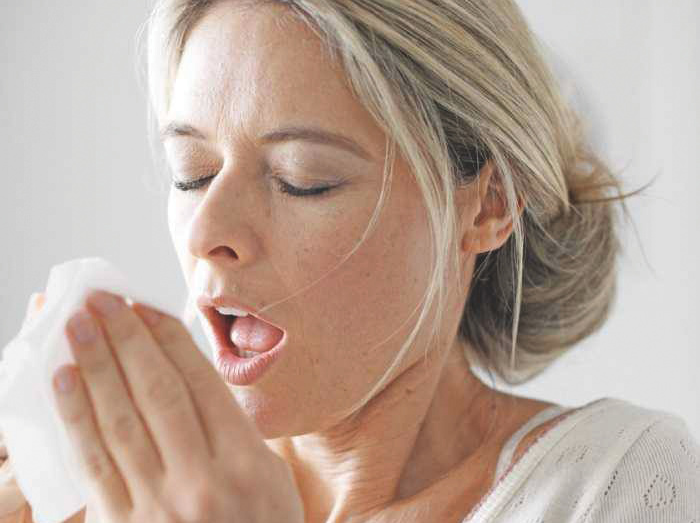 Zehnder_sneezing woman