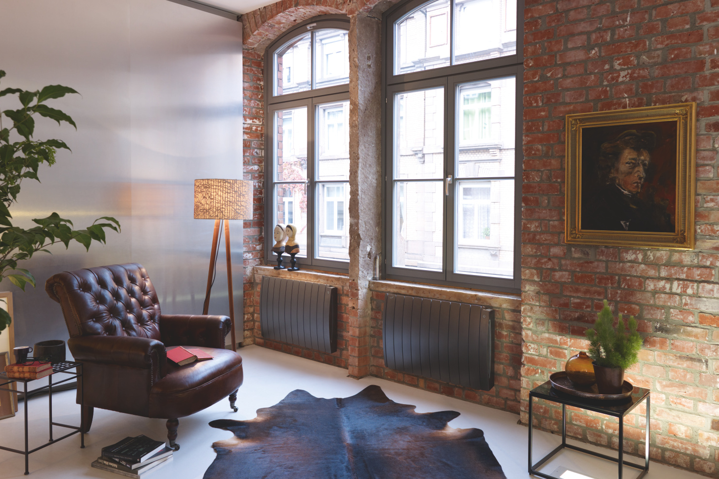 [Translate to Francais:] [Translate to Nederlands:] Een landelijke donkere designradiator in een landelijk Interieur.