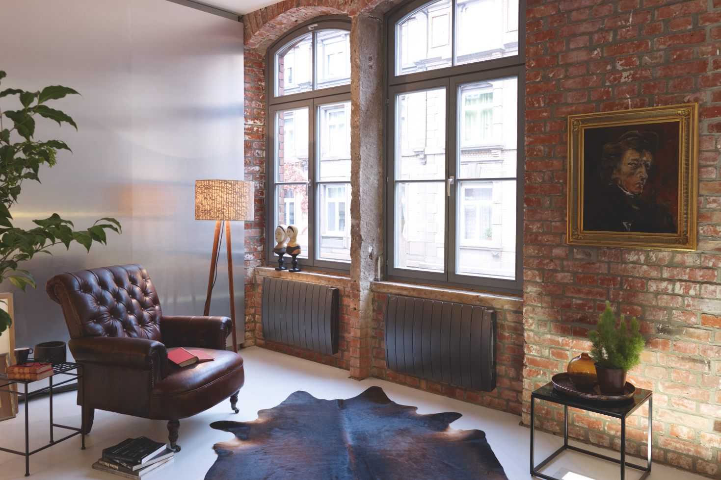 [Translate to Francais:] [Translate to Nederlands:] Een landelijke donkere designradiator in een landelijk Interieur.