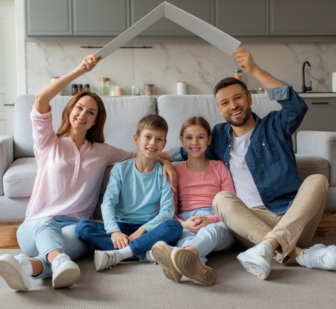 Zehnder_CSY_Key-visual_Family-under-the-roof Symbolizing love and the importance of family and home, this european family forms a house shape expressing unity and affection